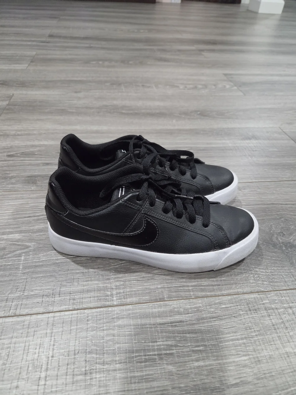 Nike Black Leather Low-Top Sneakers with White Sole
